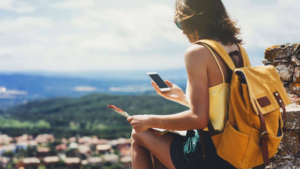 Traveler using StayApp